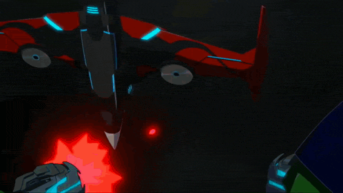 a red and black robot with blue lights on its wings is flying through the air