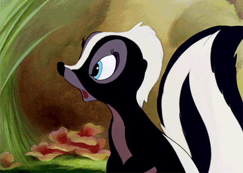 a cartoon skunk with a blue eye is looking at something