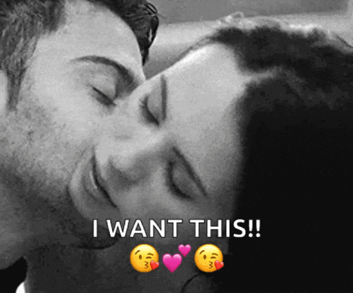 a black and white photo of a man kissing a woman with the words i want this below them