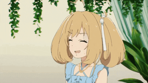 a girl with blonde hair is wearing a blue dress with a bow