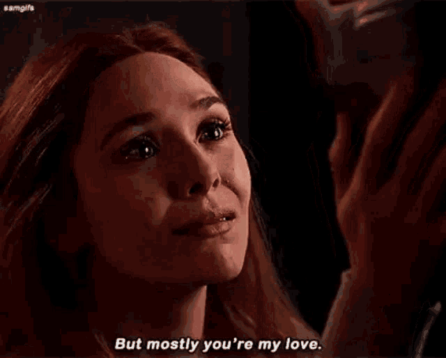 a woman is crying while holding a man 's hand and saying `` but mostly you 're my love . ''