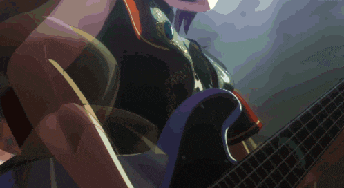a close up of a person playing a guitar with a blurred background