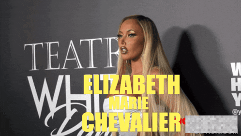 a woman stands in front of a sign that says elizabeth marie chevalier on it