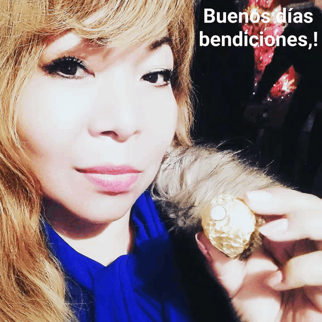 a woman holding a chocolate with the words buenos dias bendiciones written on the bottom