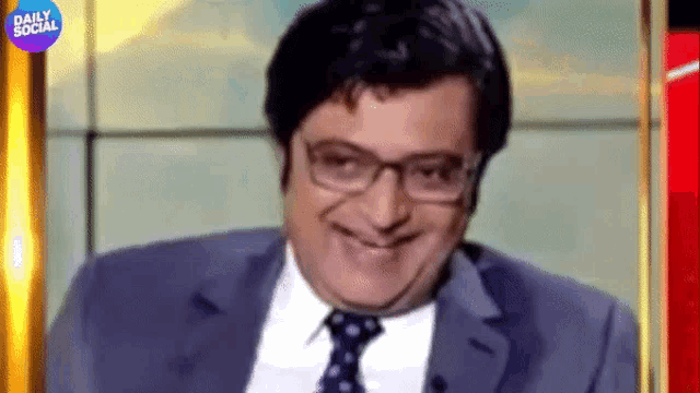 a man in a suit and tie is smiling with a daily social logo in the background