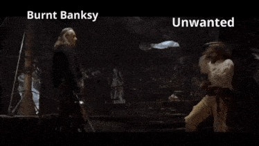 a man holding a sword standing next to another man with the words burnt banksy and unwanted on the bottom