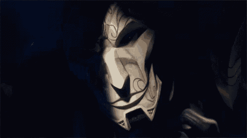 a close up of a person 's face with a mask on .