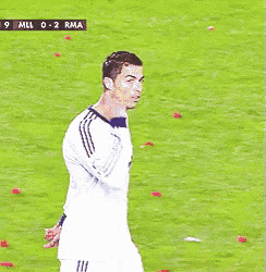 a soccer player wearing a white jersey with bwin on it