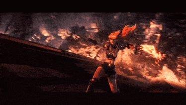 a girl with red hair is holding a sword in front of a burning city