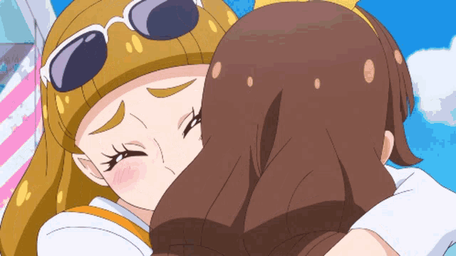 a couple of anime girls hugging each other one wearing sunglasses