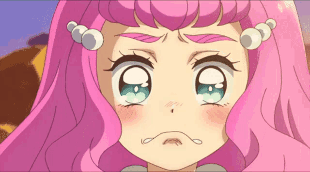 a close up of a pink haired anime girl with blue eyes