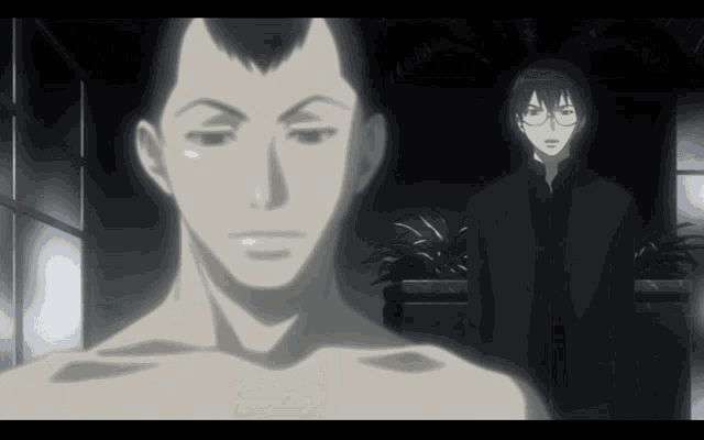 a man without a shirt is standing next to another man in a suit