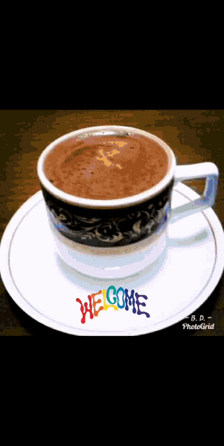 a cup of coffee sits on a saucer with welcome written on it