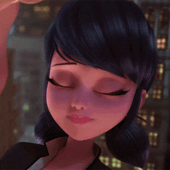 a close up of a cartoon character 's face with a smile on her face