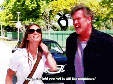 a man and woman are standing next to each other and the woman says jesus fill i told you not to kill the neighbors !