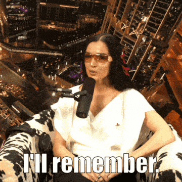 a woman sitting in front of a microphone with the words " i 'll remember " on the bottom