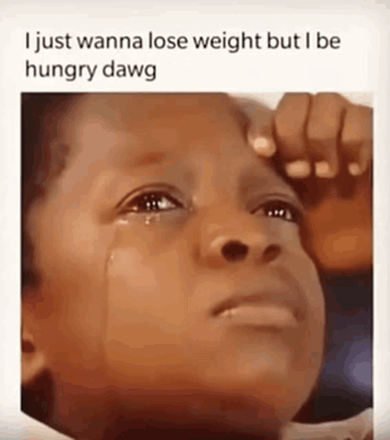 a little boy is crying with a caption that says i just wanna lose weight but i be hungry dawg .