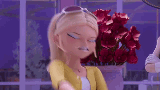 a cartoon girl is standing in front of a vase of red flowers .