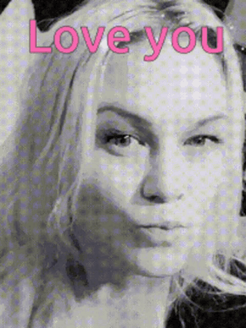 a close up of a woman 's face with the words love you in pink