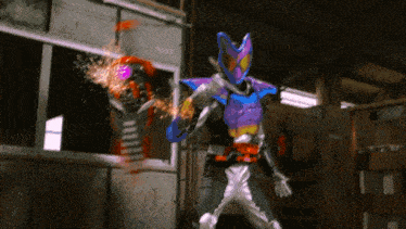 a purple and blue superhero is fighting another superhero in a dark room