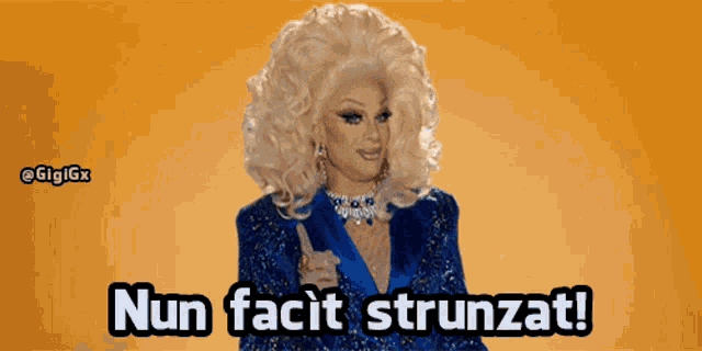 a drag queen giving a thumbs up with the words nun facit strunzat