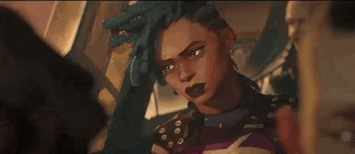 a woman with dreadlocks is holding a gun and looking at another woman .