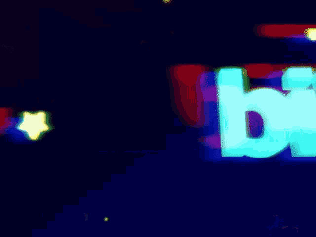 a blurry picture of a sign that says biiiim