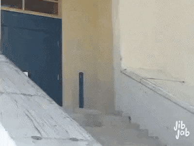 a cartoon of a man riding a skateboard down a ramp .