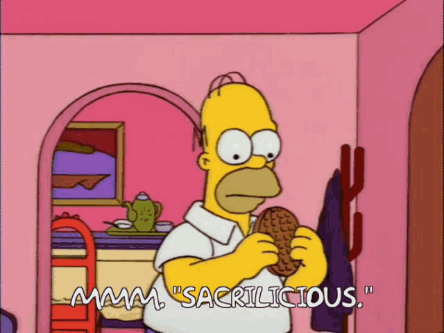 a cartoon of homer simpson holding a waffle and saying mmmm sacrilicious