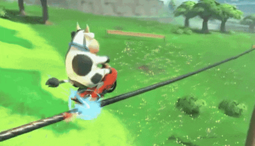 a video game character is riding a motorcycle on a road .