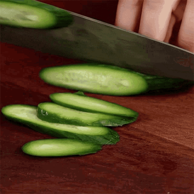 Slicing The Cucumber Maangchi GIF - Slicing The Cucumber Maangchi Cutting Cucumbers GIFs