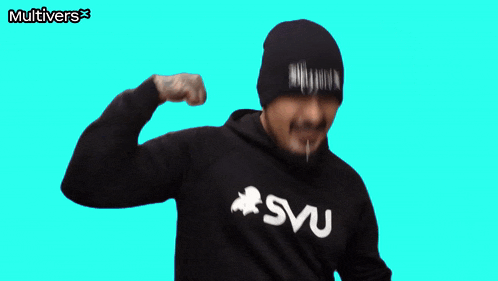 a man wearing a black svu hoodie flexes his muscles