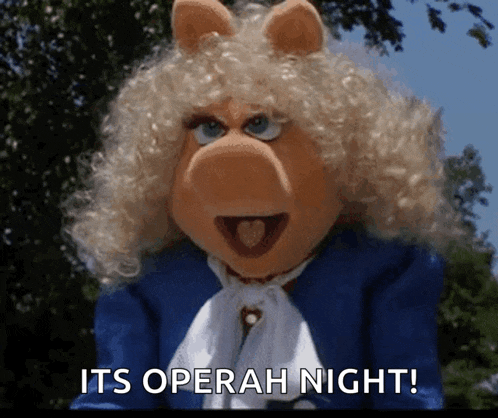 miss piggy is wearing a blue jacket and white scarf and says its operah night