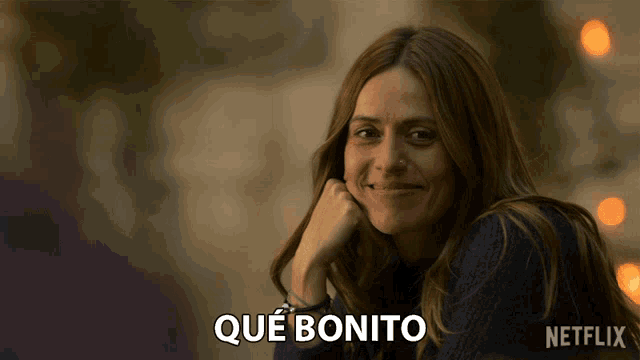 a netflix ad features a woman smiling and says " que bonito "
