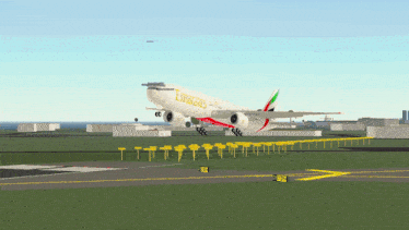 an emirates plane is taking off from an airport runway