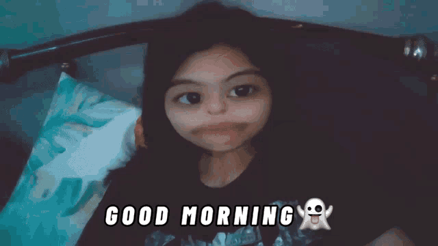 a girl laying on a bed with the words " good morning " written above her