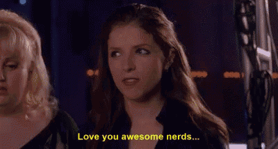 a woman is standing next to another woman and says " love you awesome nerds " .