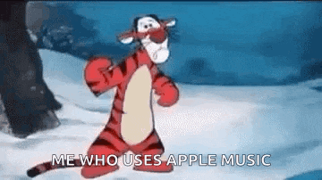 tigger from winnie the pooh is dancing in the snow while saying `` me who uses apple music '' .