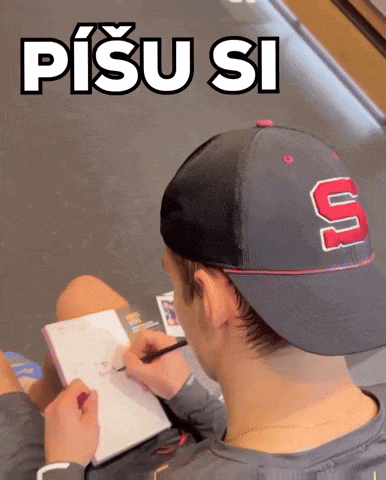 a man wearing a gray hat with the letter s on it