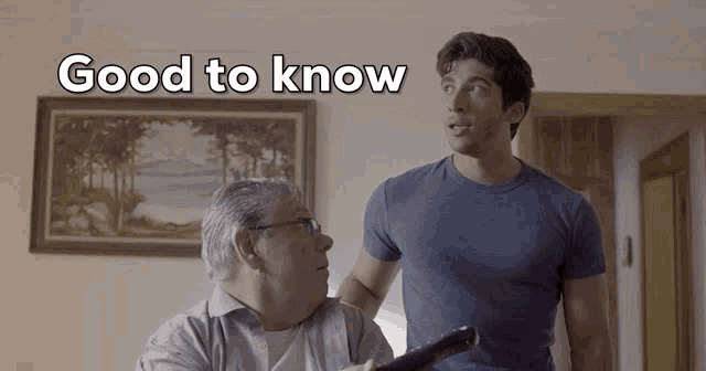 a man in a blue shirt is standing next to an older man with the words good to know above them