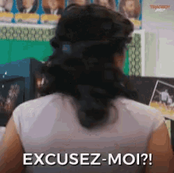 a woman 's back is shown with the words excusez-moi written on her back