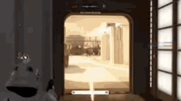 a person is playing a video game and looking through a scope at another person .
