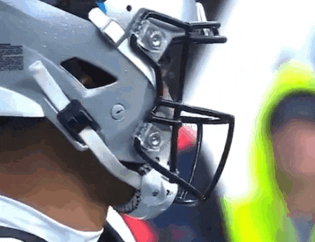a close up of a football player 's helmet that says ' nfl ' on it