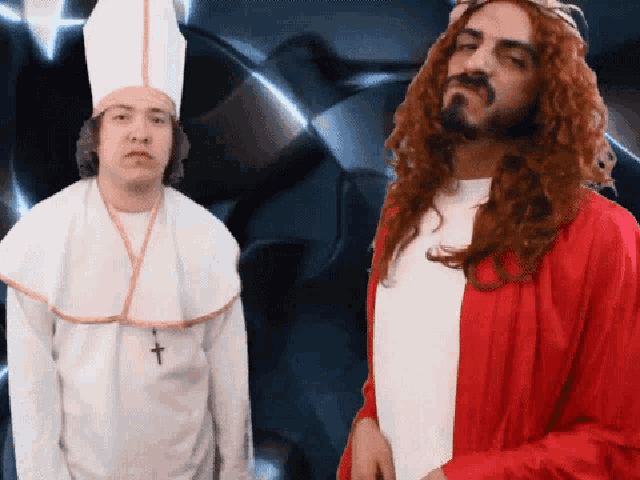 a man dressed as jesus and a man dressed as a priest