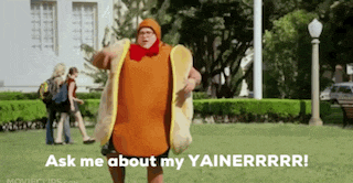 a man in a hot dog costume says " ask me about my yainerrrr "