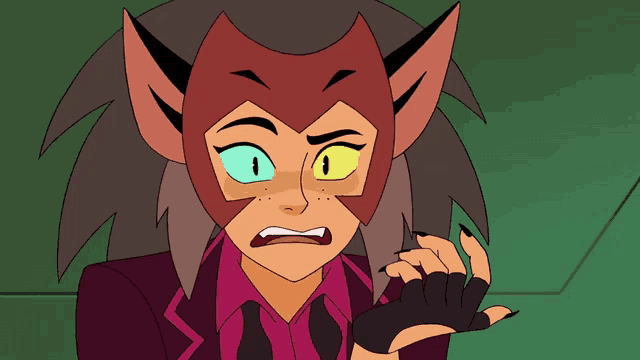 a close up of a cartoon character with cat ears