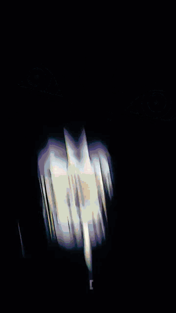 a blurred image of a sunset with a yellow and blue background