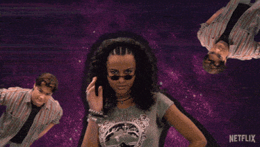 a woman wearing sunglasses and a t-shirt that says netflix