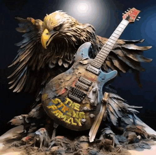 a guitar with the words " the strong family " painted on it