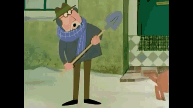 a cartoon man is holding a shovel in his hand while standing in the snow .